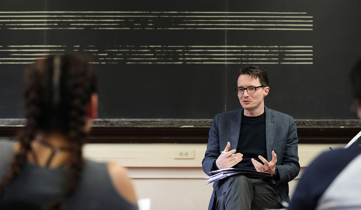 Music professor teaching students